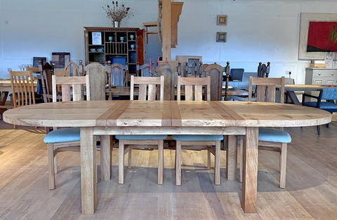 Handmade Oval Extending Dining Table with 2 leaves side view