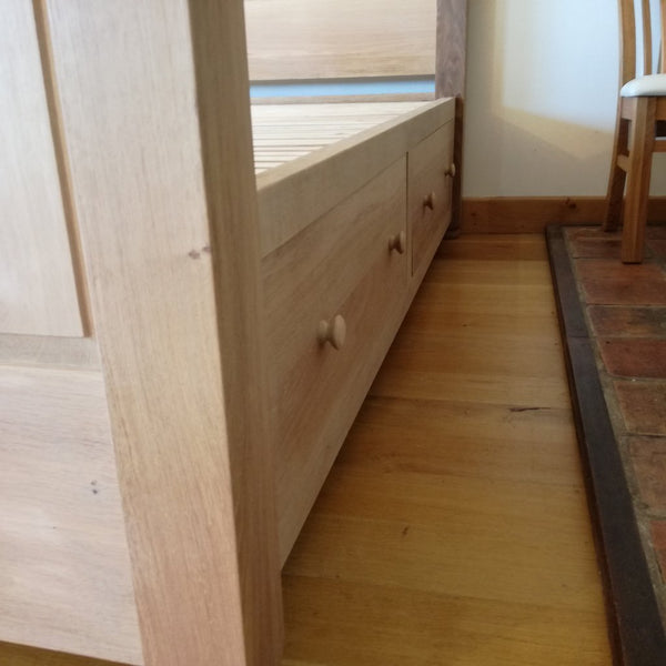 Grand Oak Bed with Storage drawer close up