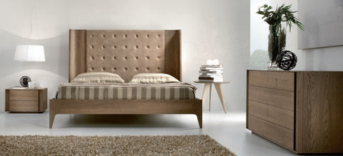 Oak bed with leather headboard