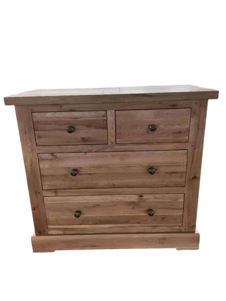 2 over 2 chest of drawers with a light oak finish