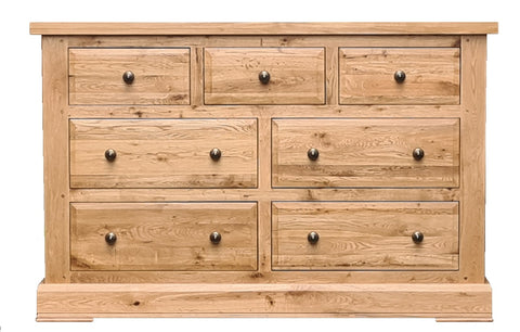 Solid oak 3 over 4 chest of drawers