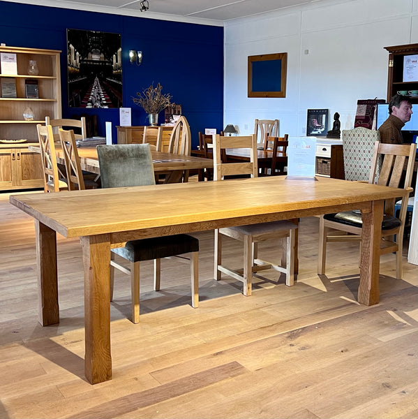 Handmade oak boarded refectory dining table by Country Ways Oak Furniture Makers