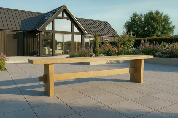 Outdoor Dining Furniture - Oak Slab End Bench on patio of modern barm