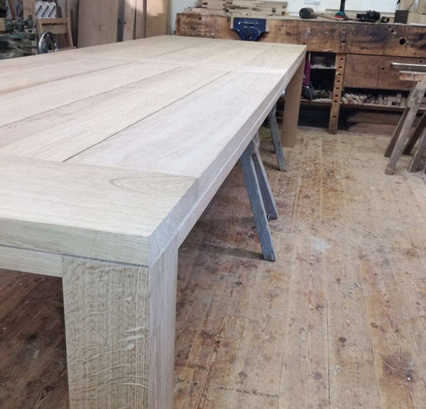 Close up of handmade oak Cannes Garden Table in our workshop