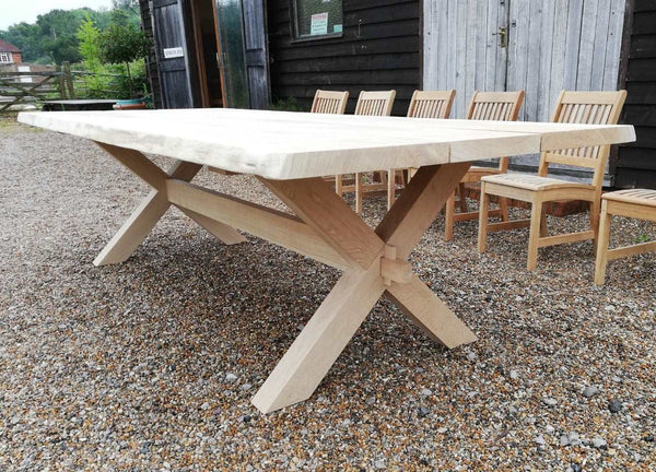 Handmade Cross leg English Oak Dining Table with waney live edge top