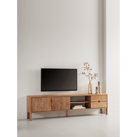 Wooden TV stand with a television mounted on a plain wall.