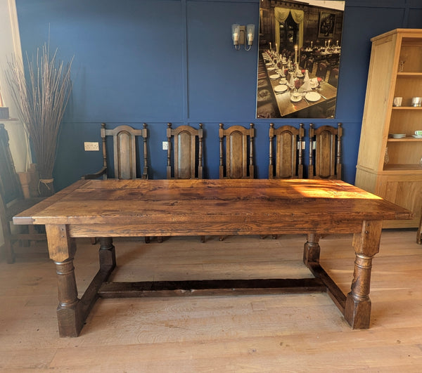 Dark oak refectory dining table with 8 x ladderback chairs