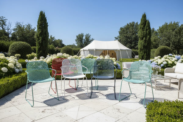 Colourful garden chairs in a garden setting