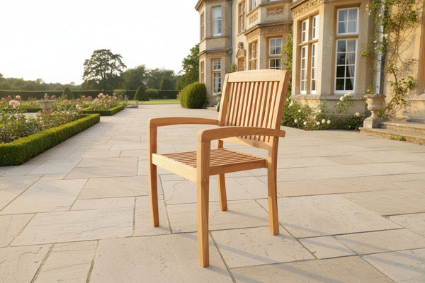 Teak Garden Stacking Chairs on patio of manor