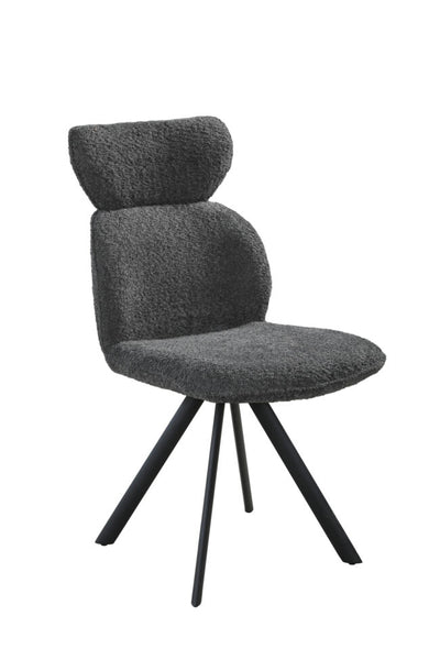 A modern upholstered dining chair with a textured dark gray bouclé seat and back, featuring a rounded headrest, curved backrest, and black metal tripod legs, shown against a plain white background.