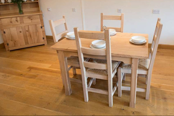 Fine Oak farmhouse Table 120 x 80, with 4 ladderback chairs in Country Ways Oak Furniture showroom