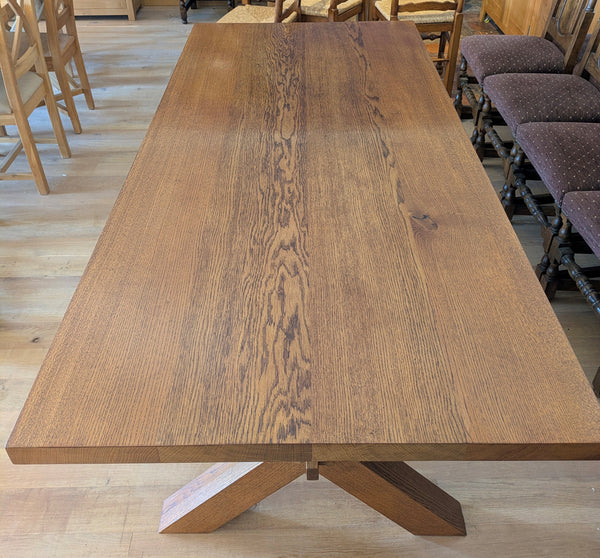 Handmade oak cross leg dining table close up of top