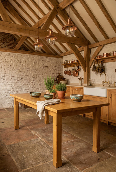 Handmade oak farmhouse table in a converted barn in Surrey