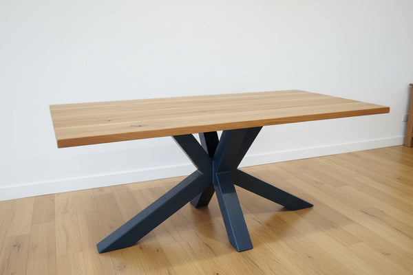 Oak table top on an angled steel base