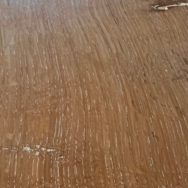 Close-up of natural oak with white in grain and knots to highlight natural grain and character of handmade oak dining table