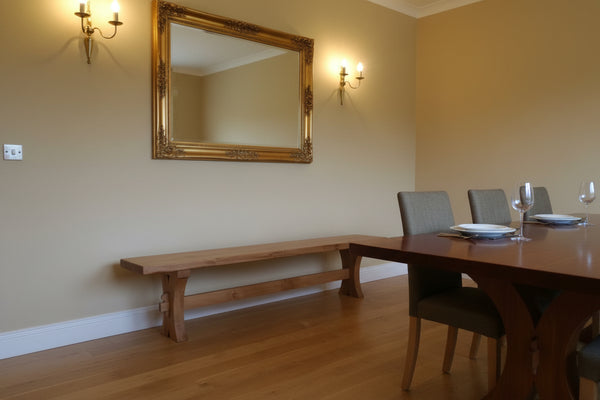 Handmade Sussex Moselle dining table with a bench in a room setting
