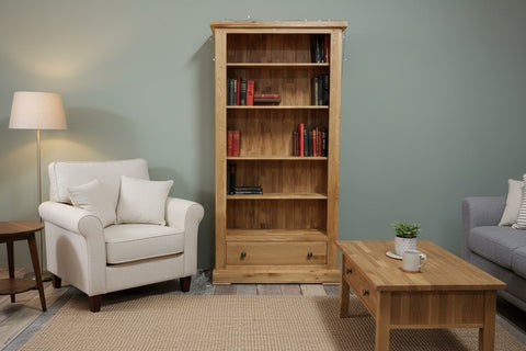 Tall solid oak bookcase with drawer