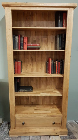 Tall solid oak bookcase with drawer