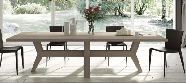 Contemporary angled oak dining table