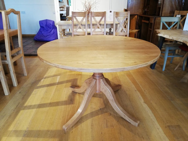 Extending oak pedestal dining table without extension