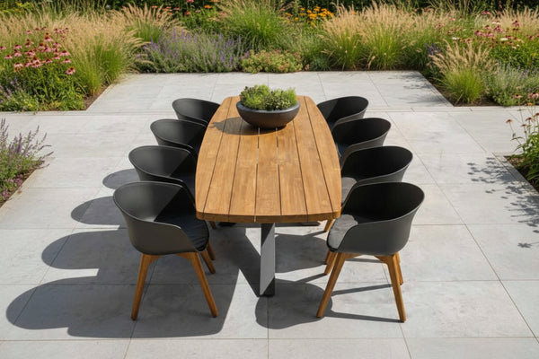 Garden table on patio surround by plants