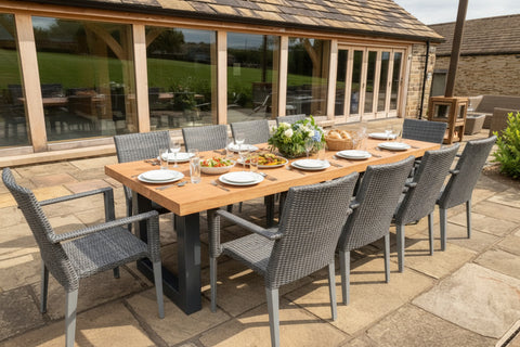 Steel & Oak garden table welded steel base with a 70 mm thick top on patio