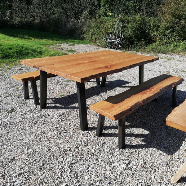 Live edge table on steel base with matching benches