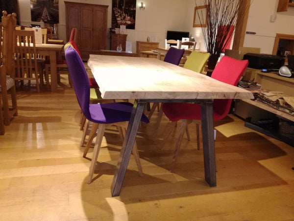 Quadpod chairs with live edge table