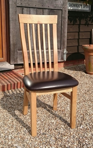 Sedlescombe oak side chair brown seat faux leather