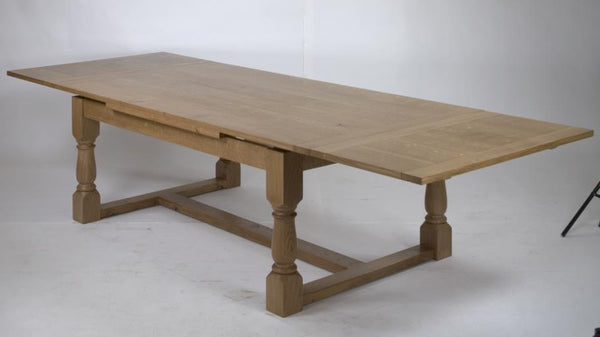 Solid oak drawleaf refectory dining table extended