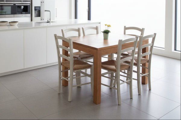 Lifestyle contemporary oak table and chairs in a kitchen setting