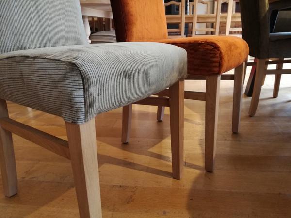 Tillingham fully upholstered oak side chairs close up