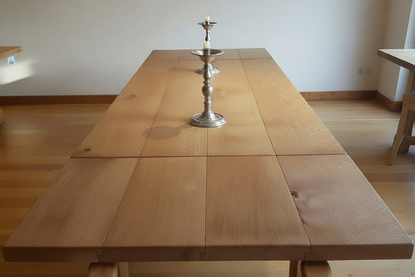Boarded refectory oak dining table top view in our showroom