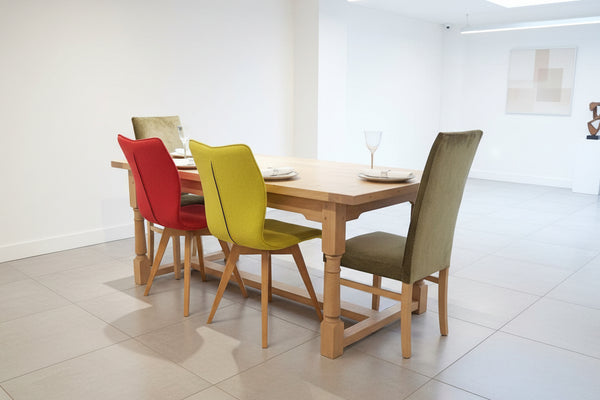 Sussex Fine Oak refectory Table in a modern house with quadpod chairs