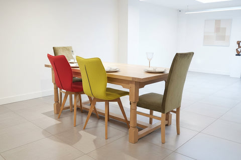 Sussex Fine Oak refectory Table in a modern house with quadpod chairs