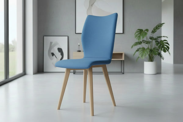 Quadpod chair blue in a modern room with artwork and a pot plant